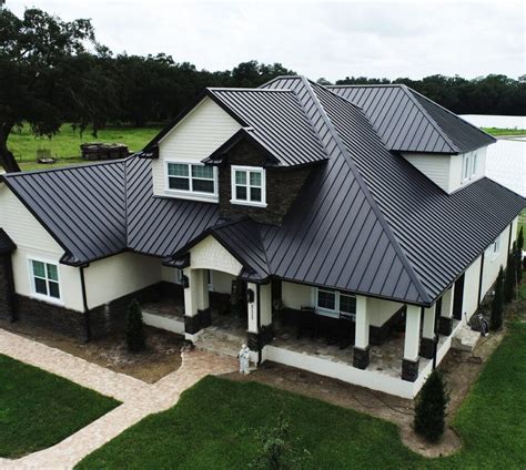 house with black shutters metal roof|black roof house designs.